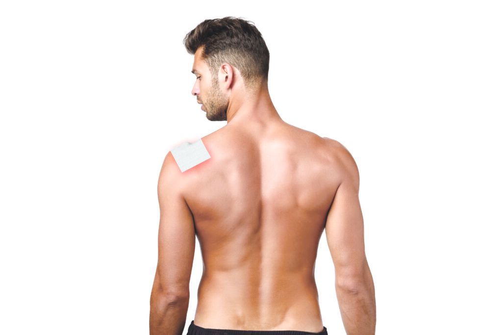 Rear view, attractive man from behind, athletic muscular back tanned sexy sportsman, turn face left, posing for gym advertisement, showing perfect body shape, fitness and exercises concept